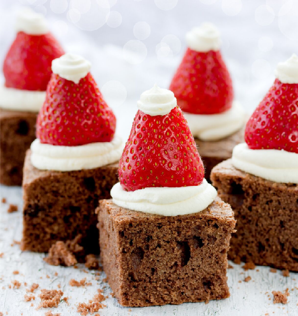Chocolate Brownies with Strawberry Santas