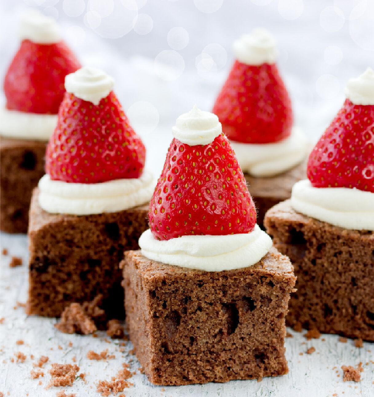 Chocolate Brownies with Strawberry Santas
